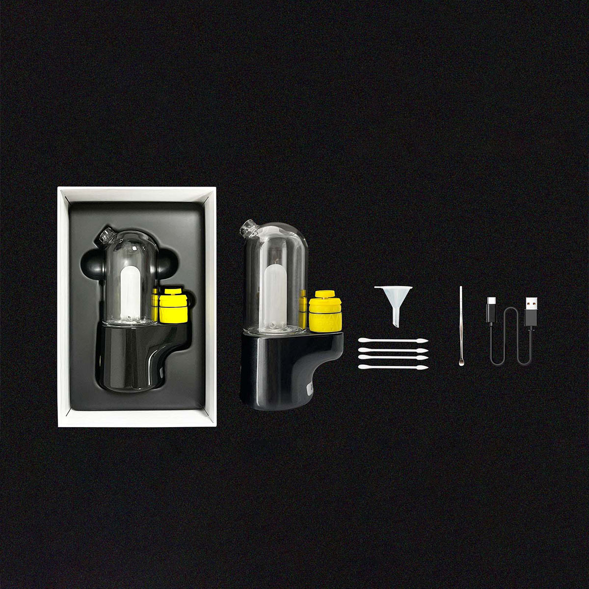  Packaging of Bomb Pro Portable Dab Rig in black with included accessories